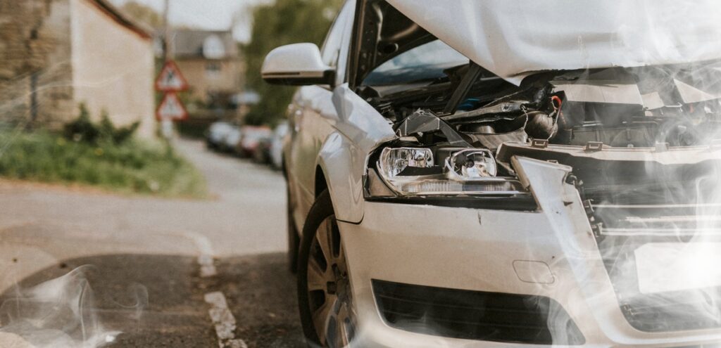Wrecked car parked on the street in Fort Branch after a car crash
